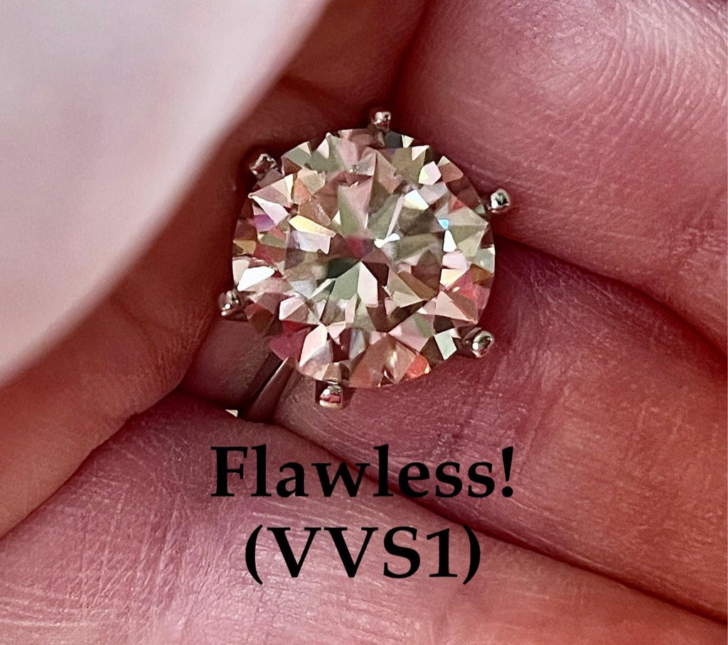 Moissanite ring. A gorgeous 10ct certified round brilliant Moissanite in a lovely crown setting, with 6 prongs and a sleek plain band!
