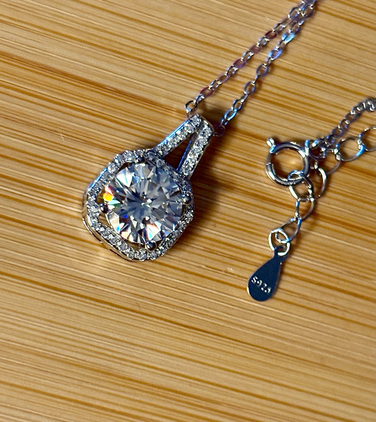 Moissanite necklace. A 2ct certified Moissanite set within an octagonally-shaped halo of pavé-set gleaming white zircons - at a 1ct price!