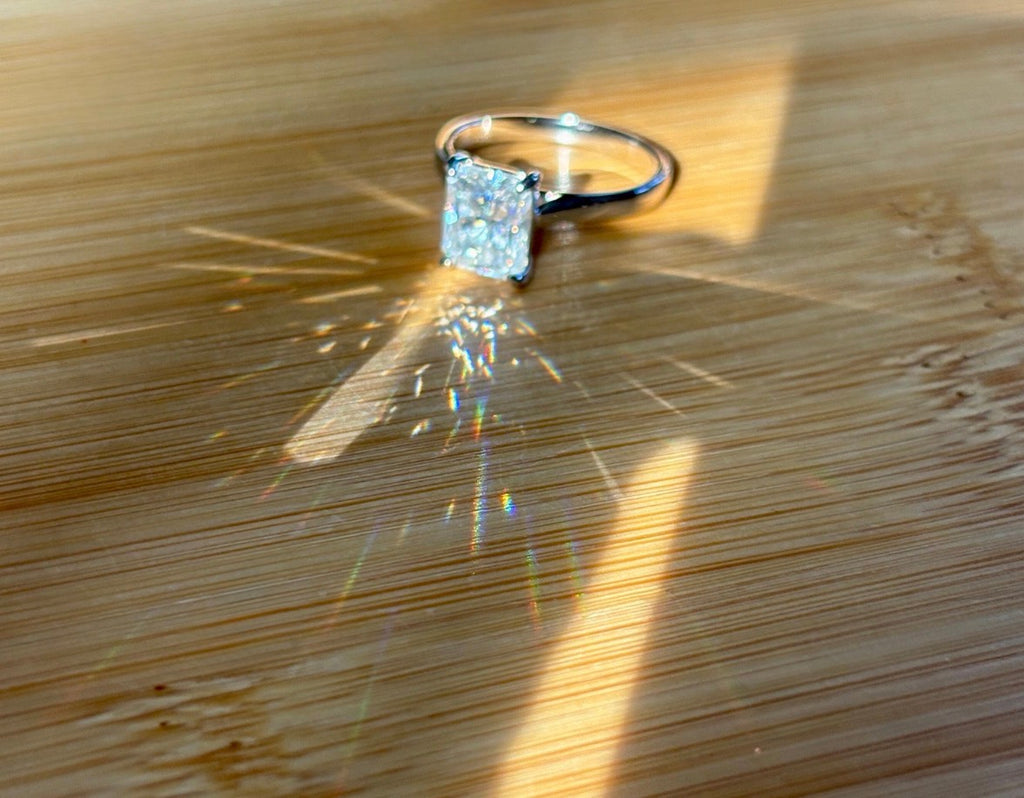 A certified Moissanite 3ct radiant solitaire! An UBER flashy, ULTRA classy, contemporary and chic radiant-cut engagement ring!