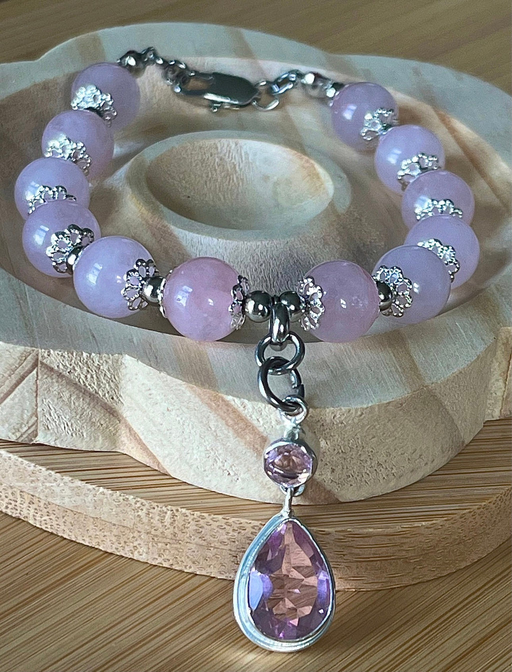Rose quartz bracelet with 10mm Brazilian rose quartz beads and durable stainless steel components! The morganite pendant is optional.