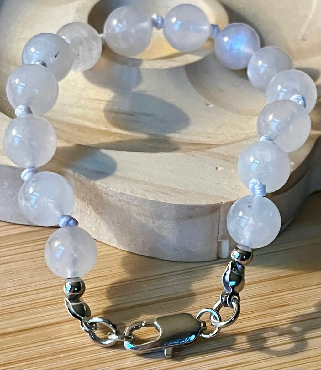 Glowing moonstone bracelet. High quality hand knotted 8mm moonstone bracelet with stainless steel or yellow gold plated stainless steel hardware!