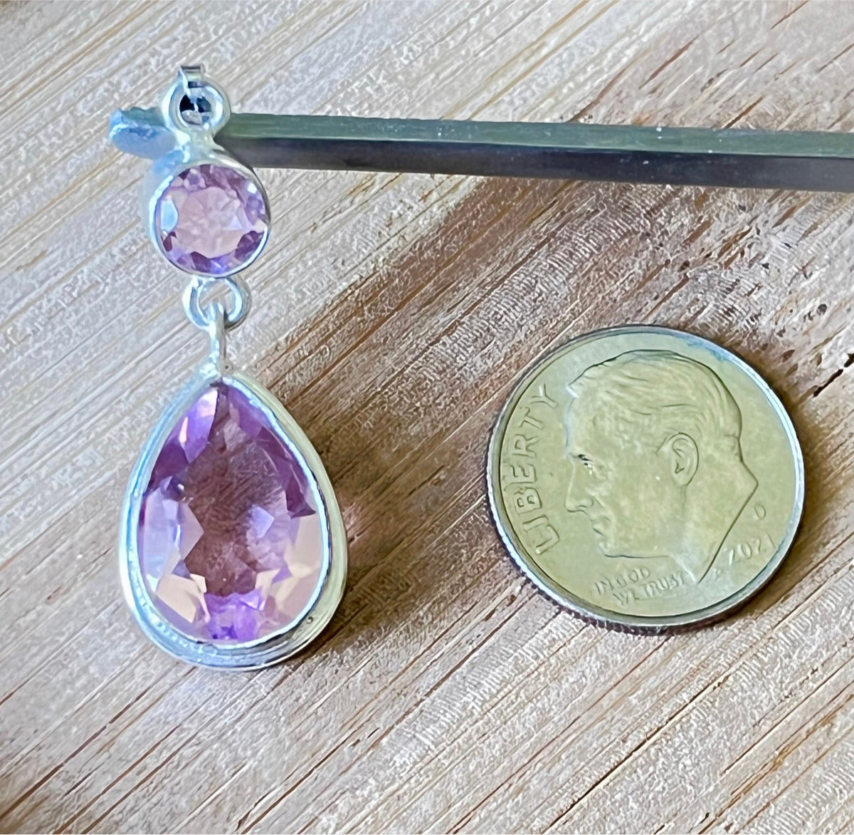 Lab tanzanite pendant and lab morganite pendants, and natural amethyst and moonstone pendants. All in solid sterling silver!