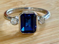 Blue sapphire and Moissanite ring. A certified 3ct lab-grown emerald-cut sapphire and .20ctw Moissanite ring in 925 sterling OR 935 Argentium!