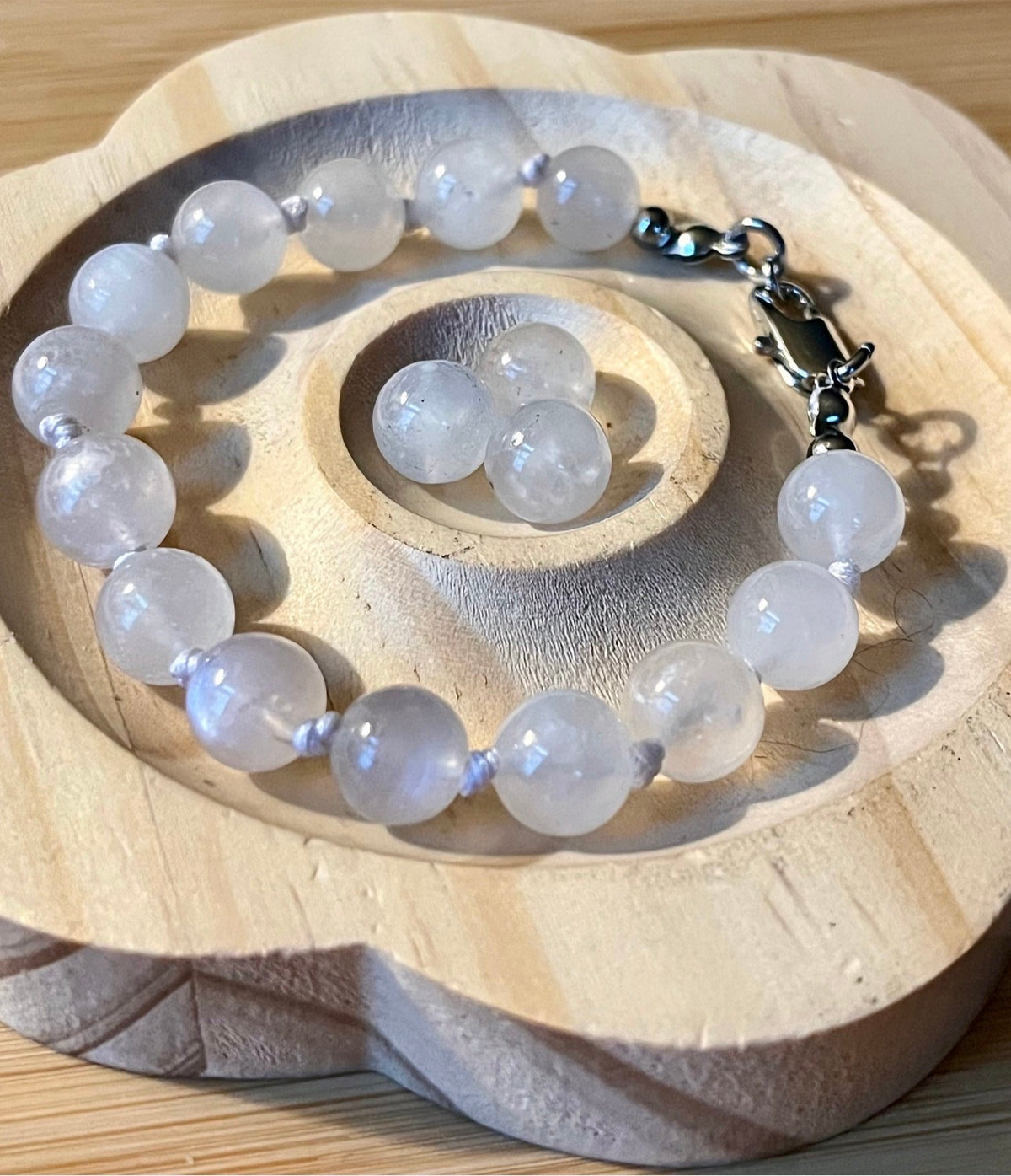 Glowing moonstone bracelet. High quality hand knotted 8mm moonstone bracelet with stainless steel or yellow gold plated stainless steel hardware!