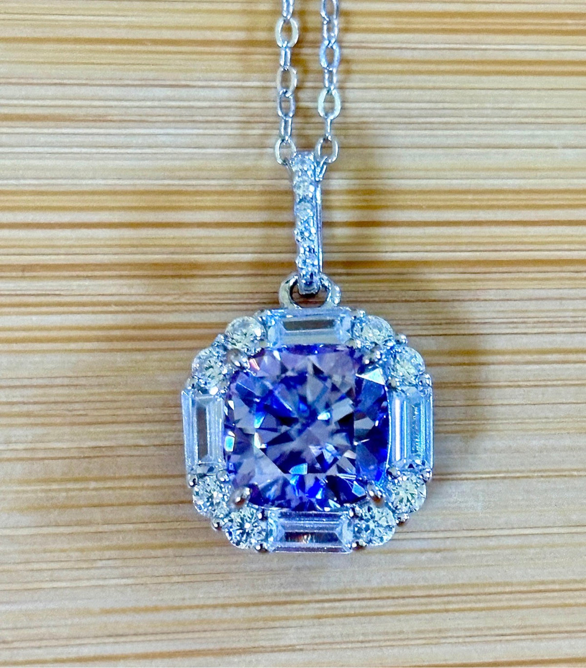 Moissanite necklace. A certified 2.5ct white, deep blue or purple cushion-cut Moissanite in a 1.5ctw multi-cut zircon halo, a 4ctw pendant that’s eye-catching and super flashy!