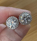 Moissanite earrings. A glittering 5.44cttw pair of certified Moissanites and white zircons in 18k gold-embraced sterling silver! Perfection!