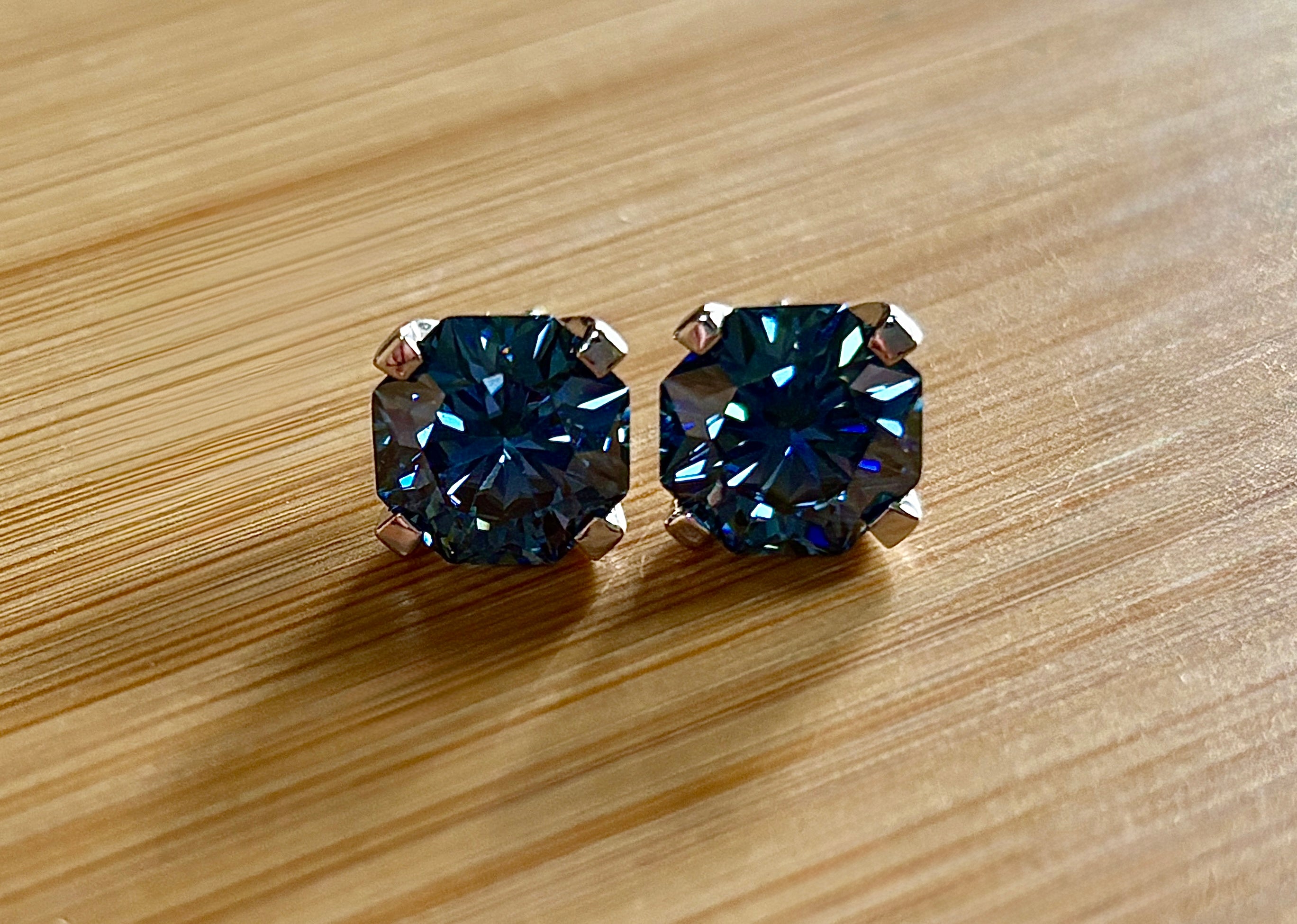 A *PHENOMENAL* 2.4cttw or 6cttw DOUBLE certified pair of octagonal-cut, star-faceted, royal blue Moissanite studs in 935 Argentium silver!