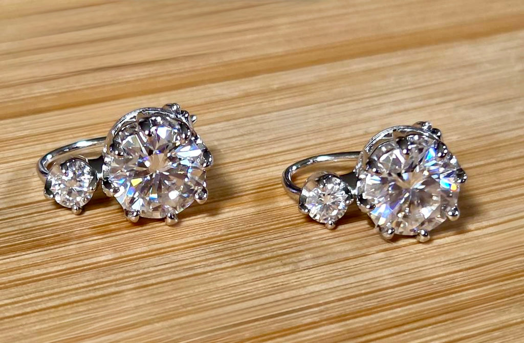A Victorian inspired 4.2cttw certified pair of Moissanite 2-stone buckle back earrings in Argentium silver! Minimalist glam!