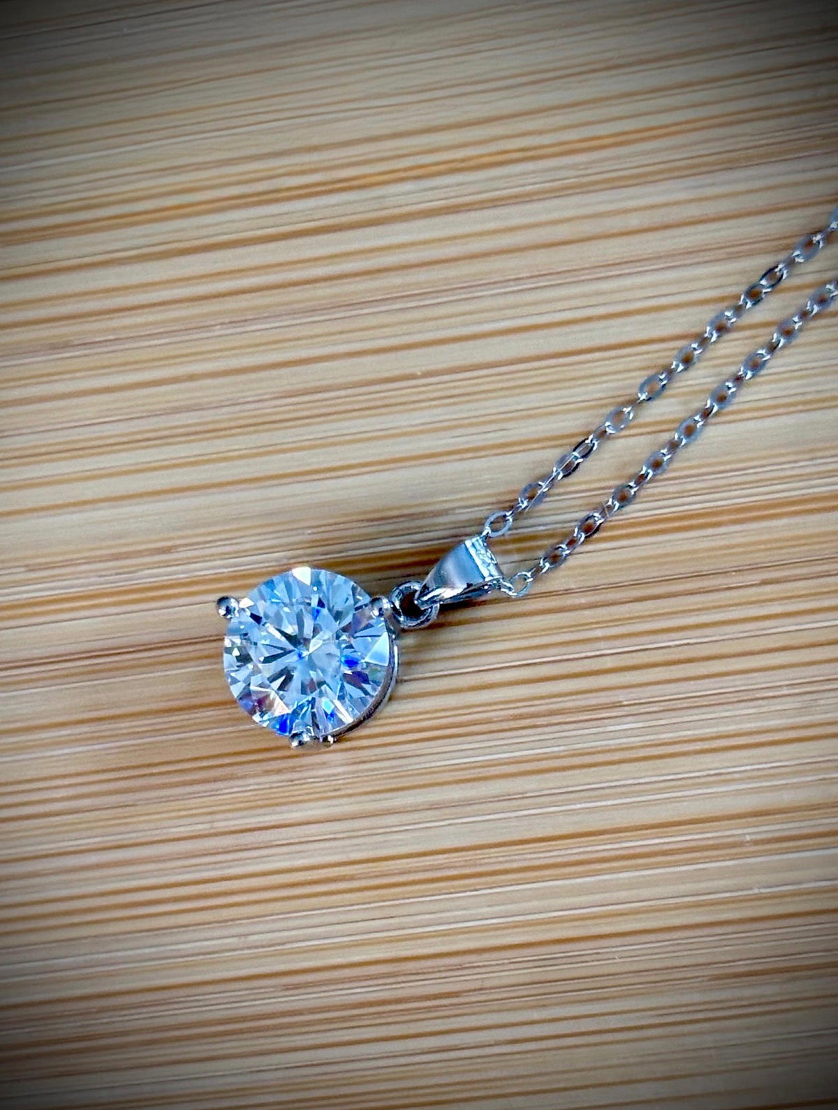 Moissanite necklace. A bright, white 3ct Moissanite solitaire in a minimalist sterling silver 3-prong mounting! Just gorgeous!