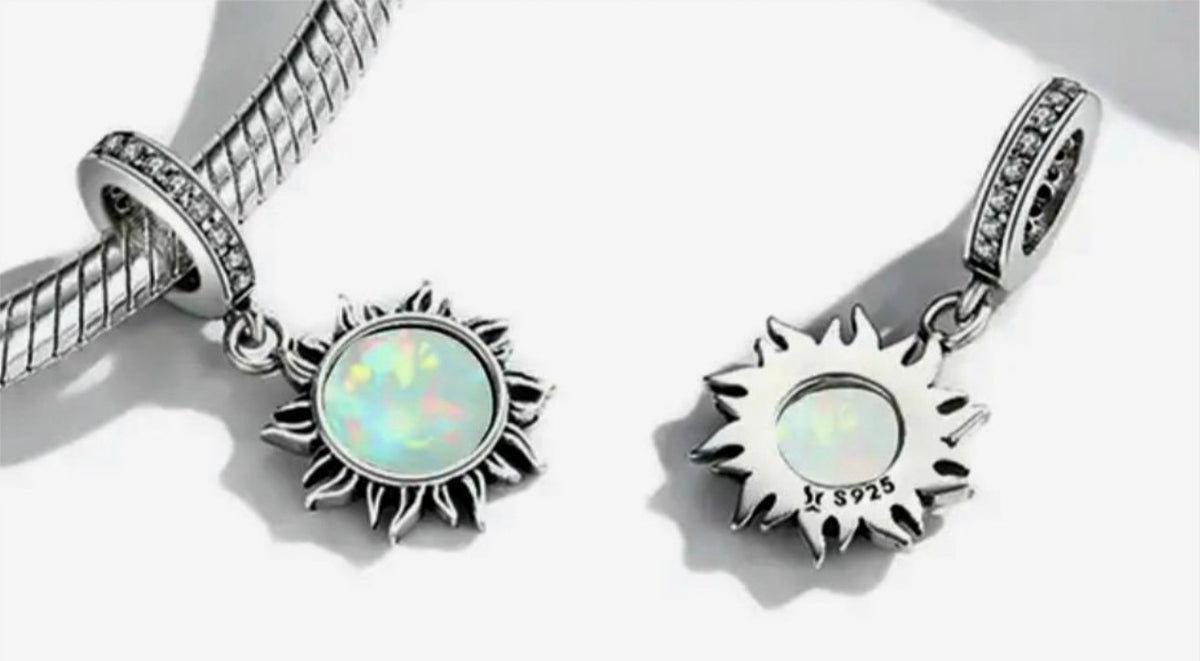 Rose charms and created opal charm! All solid sterling silver charms!