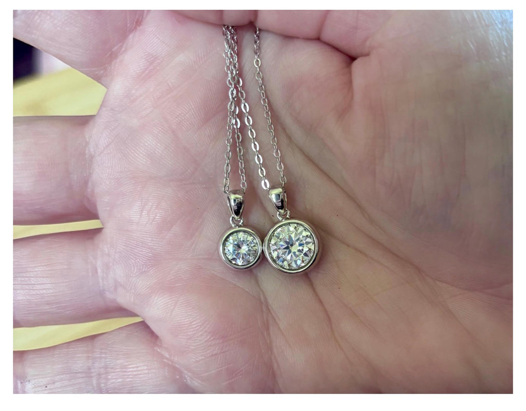 Moissanite necklace. My fiery “bubble bezel” necklace features a 1ct OR 3ct certified Moissanite in a heavy sterling silver bezel setting!
