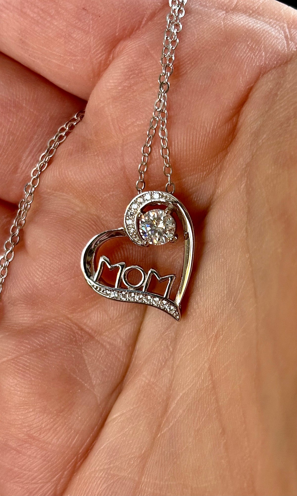 Moissanite necklace. A certified 1/2ct round radiant Moissanite in a pendant just for your mom or because you’re a mom, in sterling silver with zircon accents!