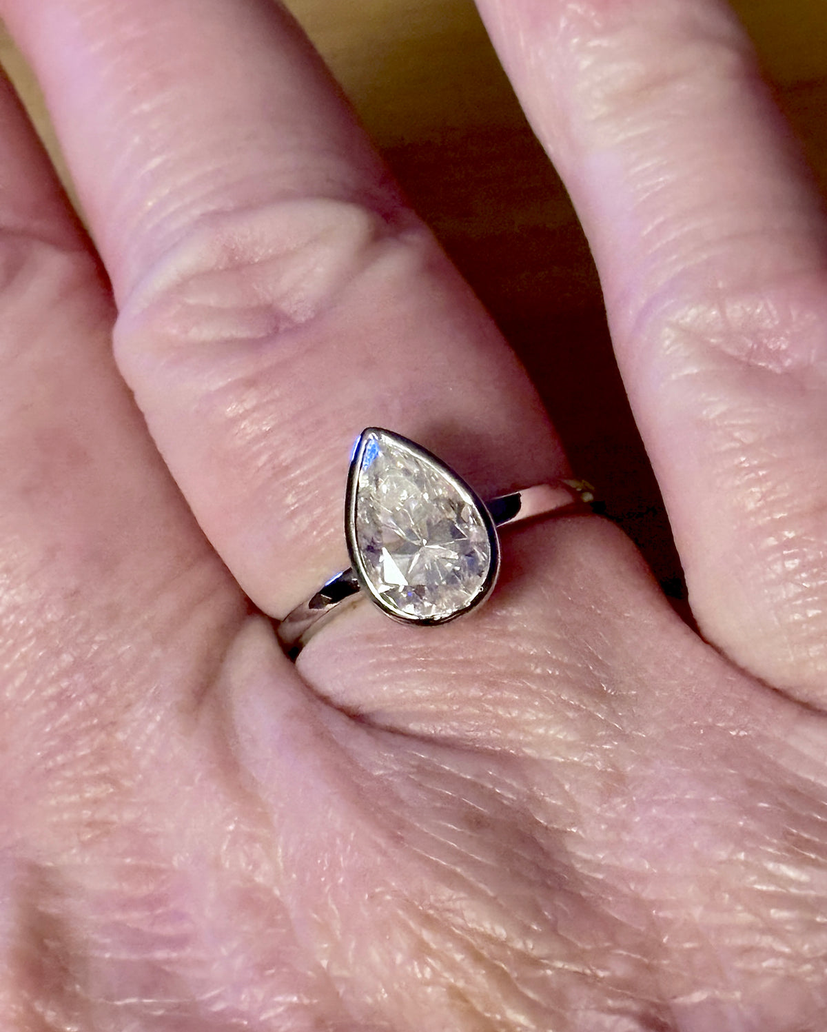 Moissanite ring. A certified 3ct pear in a hybrid basket + bezel of 925 sterling or 935 Argentium silver! A Hand Knotted Jewelry EXCLUSIVE!