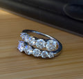 Moissanite ring. A deliciously decadent, sparkling 3.46cttw certified Moissanite bypass ring in heavy sterling or ARGENTIUM silver and 18k!