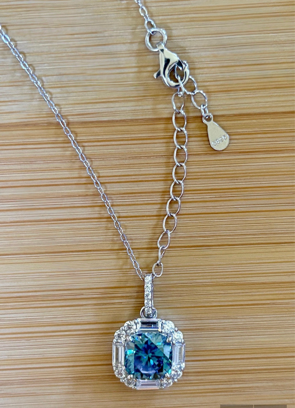 Moissanite necklace. A certified 2.5ct white, deep blue or purple cushion-cut Moissanite in a 1.5ctw multi-cut zircon halo, a 4ctw pendant that’s eye-catching and super flashy!
