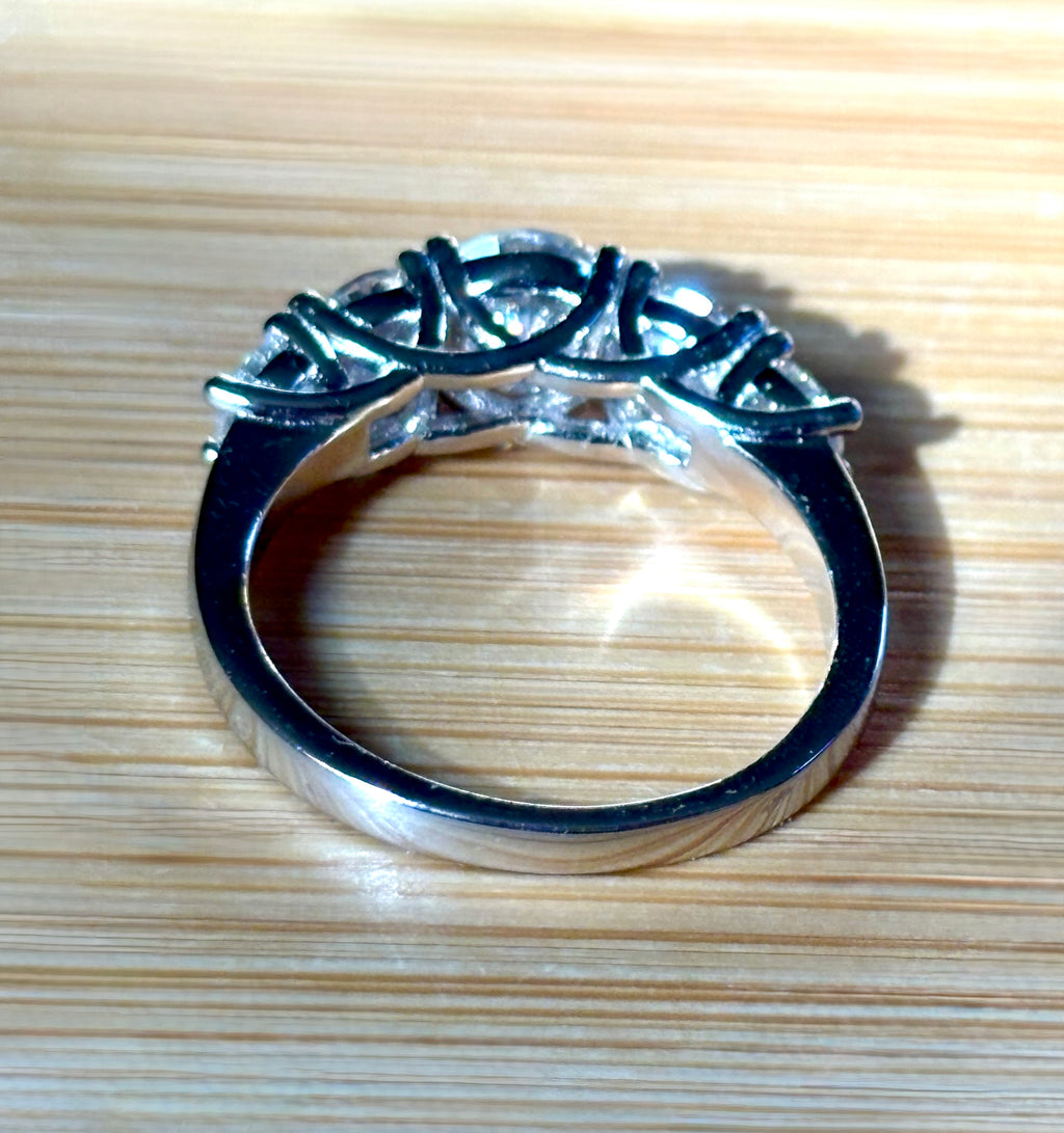 Moissanite ring. A 2.5ctw certified Moissanite ring, for those who want plenty of sparkle but a daintier ring! This feminine 5-stone design is just the thing!