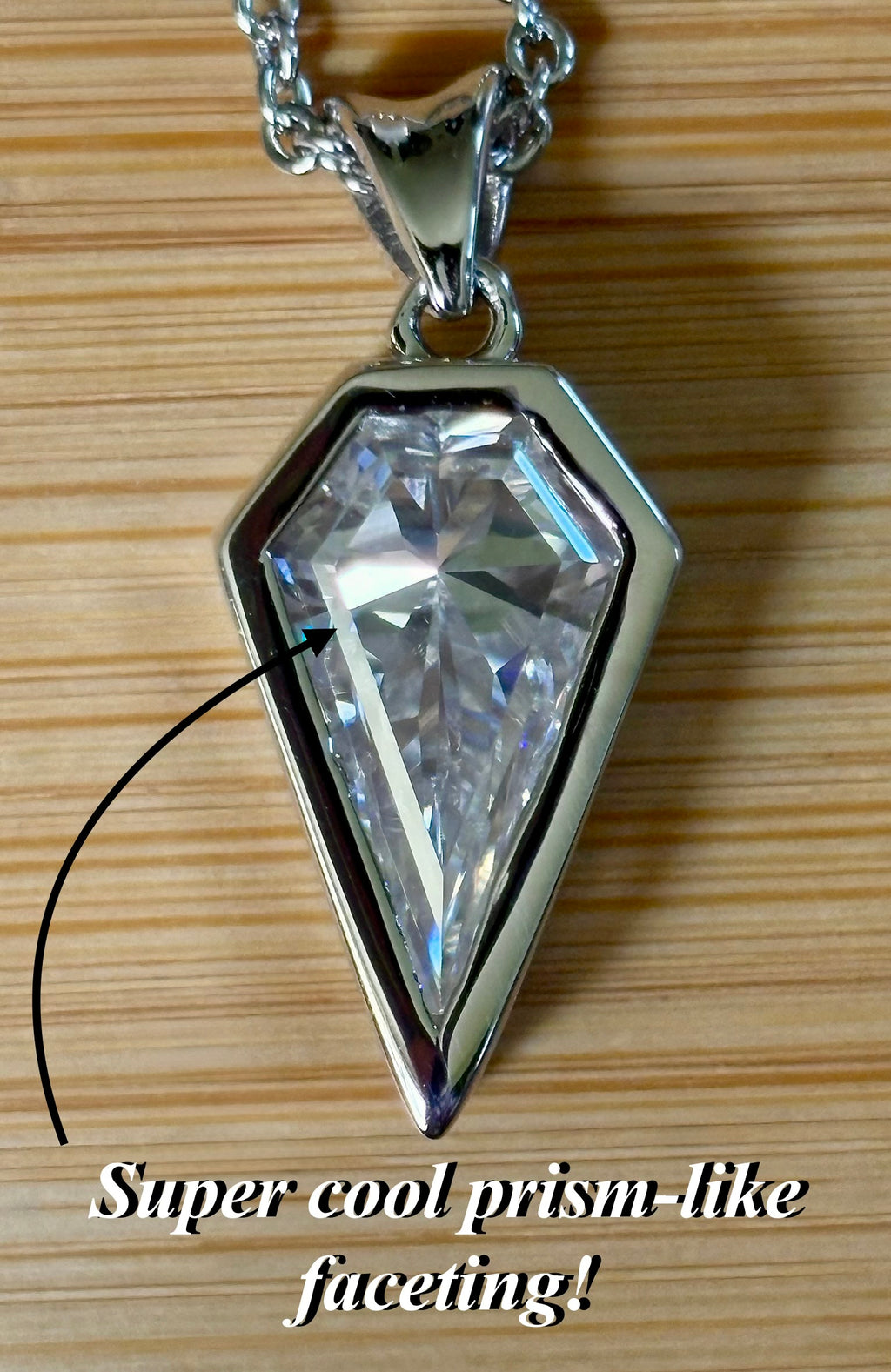 Moissanite necklace. “Flight!”, a kite-shaped, custom-cut 5ct Moissanite pendant! Hand-faceted by a master stone cutter and set in Argentium silver, it is suspended on a 20” sterling silver chain and is exclusive to Hand Knotted Jewelry!