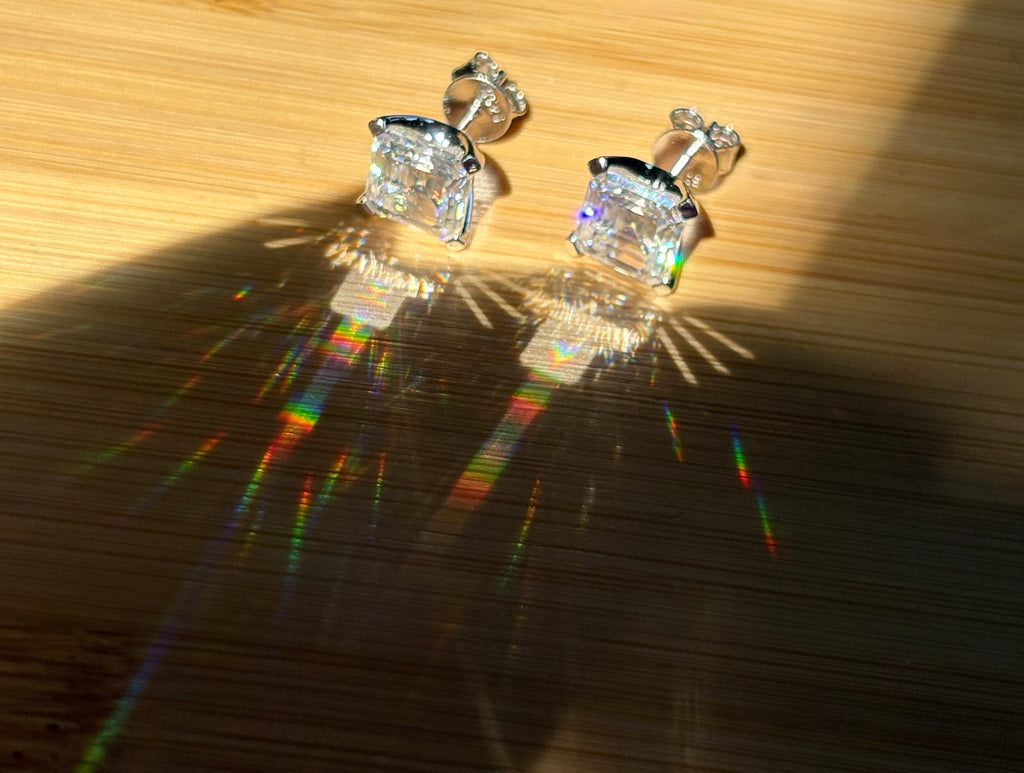 Moissanite studs. A 6.4ctw *perfect* pair of DOUBLE certified Asscher-cut Moissanites in my custom 4-claw 935 ARGENTIUM silver mountings! Opulent!