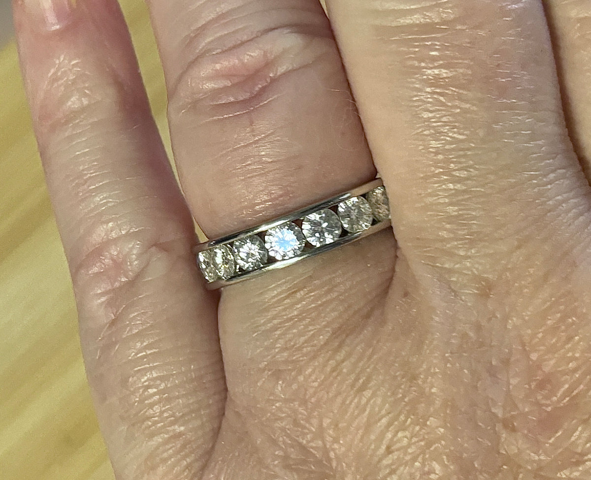 Moissanite ring. A 5.10cttw or 4.8cttw (depending on size) Moissanite eternity ring. A channel-set, classy and classic design - beautiful!