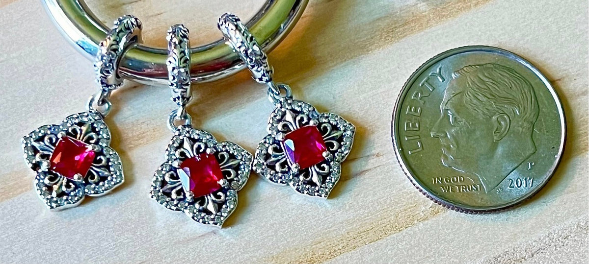 Butterfly charm, flower charm and fleur de lis charm! All solid sterling silver charms!