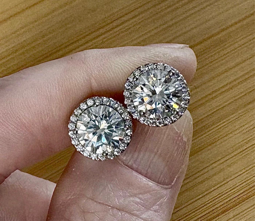 Moissanite earrings. 2.96cttw Moissanite halo stud earrings in sterling silver and 18k! Purely exquisite and red-carpet glamorous!