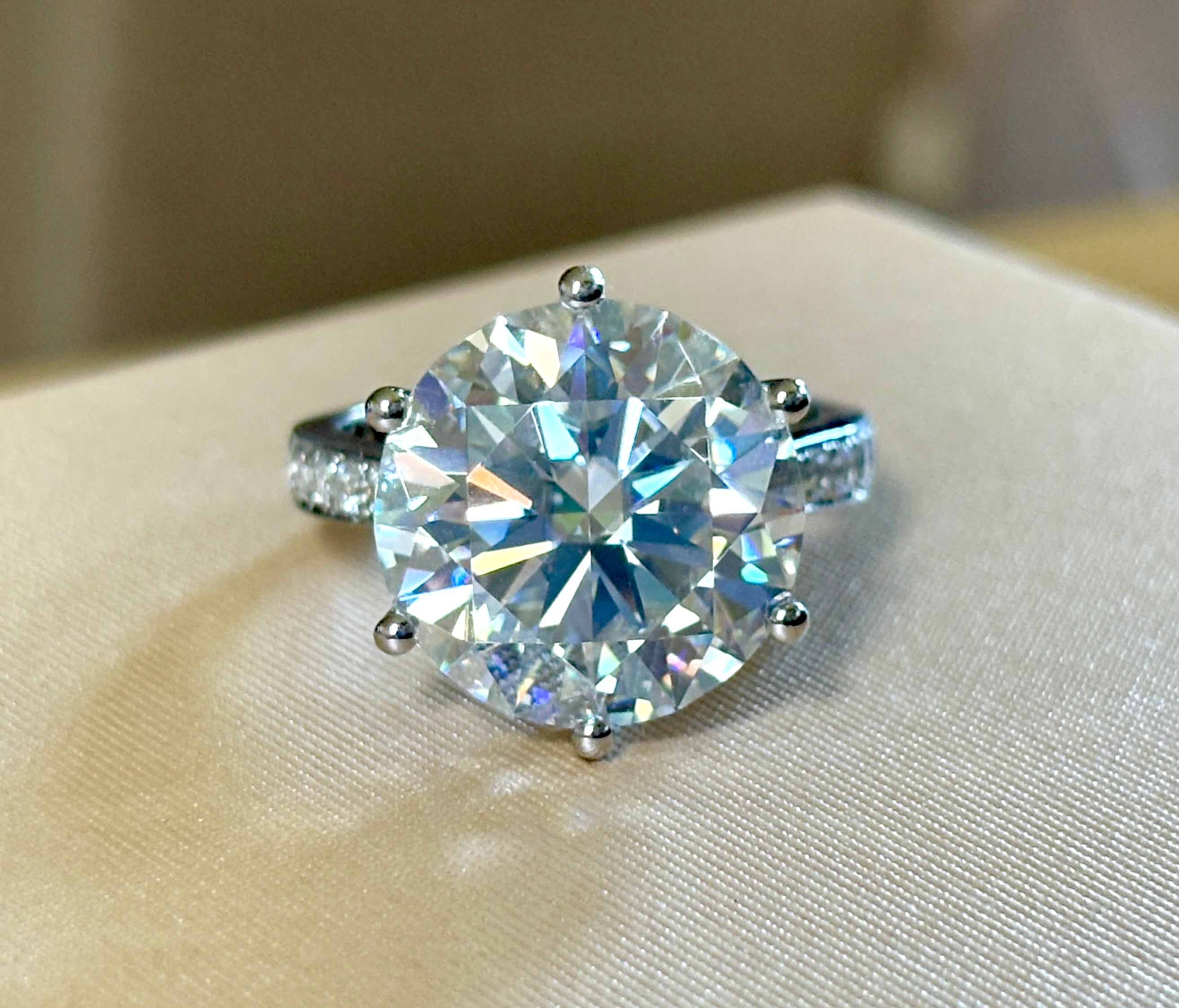 Moissanite ring. The 10ct certified 8H8A Moissanite “Tulip” statement ring with .50cttw Moissanite accents! Photos fail this GORGEOUS ring!