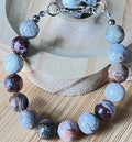 Mexican crazy lace agate bracelet/10mm Laguna lace agate with crisp strata patterns and earth tones! Nature’s creative power at its finest!