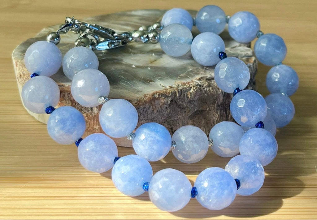 Aquamarine bracelet and/or earrings. The “Silent Night” faceted aquamarine hand knotted bracelet with METALLIC string and your choice of yellow gold plated or silvery stainless steel bracelet hardware!