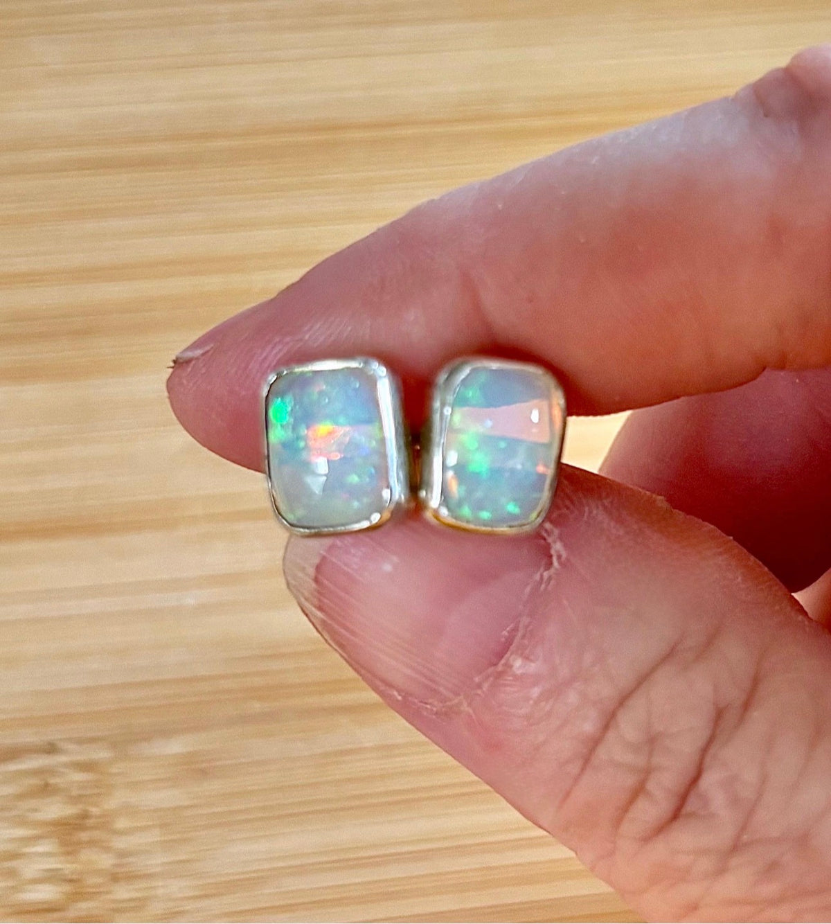 Ethiopian opal earrings, pair B. A beautiful pair of rectangular Ethiopian opal earrings, approximately 4cttw and hand-set in sterling silver bezels!