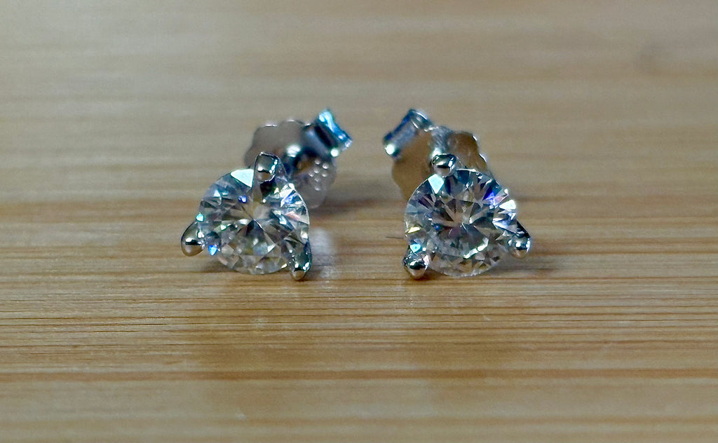 1ctw DOUBLE certified Moissanite studs, D-color and VVS1 clarity in delicate 3-claw settings! Minimalist design with substantial fire!