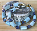 Aquamarine and tanzanite bracelet. The “True Blue” bracelet features trendy aquamarine barrels and dusky tanzanite cubes!