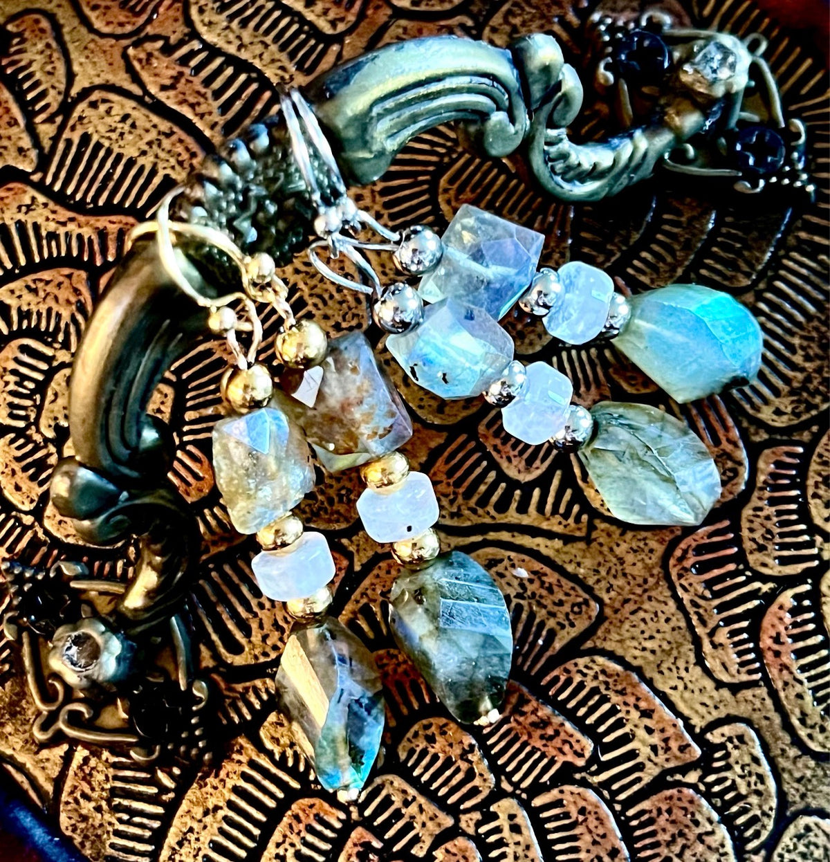 Labradorite and moonstone bracelet and/or earrings. The “Essences of Gemstones” bracelet with hand- faceted “essence” stones! This bracelet literally glows!