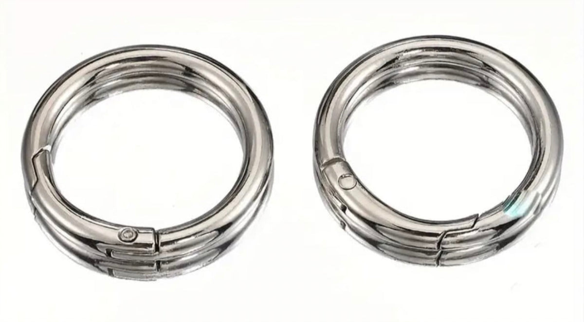 Sterling silver double lobster claw clasps, stainless steel charm keepers, 925 earring rings/charm holders and other miscellaneous jewelry items.