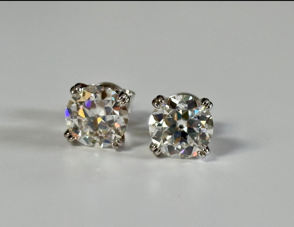 A lovely DOUBLE certified pair of 4cttw Old European Cut Moissanite studs in 935 Argentium silver and 18k double-claw mountings!
