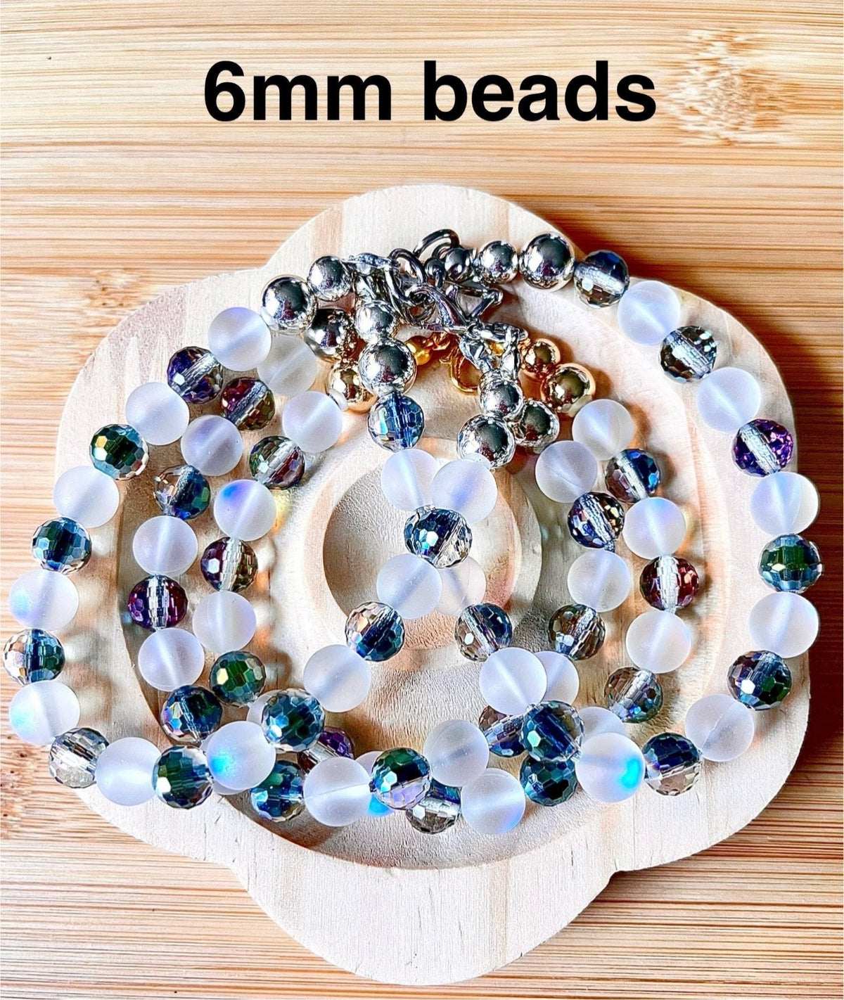 Austrian crystal bracelet with your choice of 6mm or 10mm frosted crystal beads, with golden or silvery stainless steel hardware.