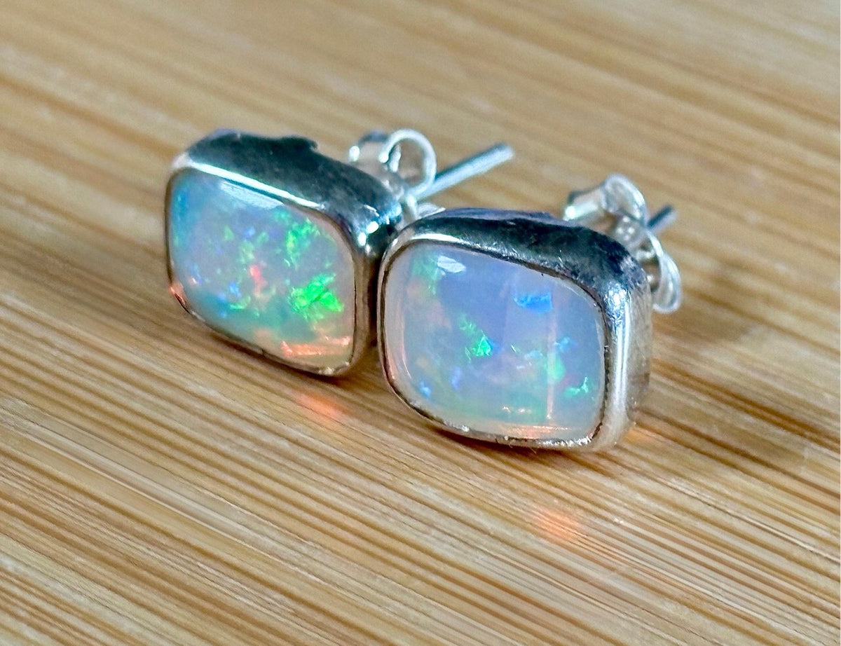 Ethiopian opal earrings, pair B. A beautiful pair of rectangular Ethiopian opal earrings, approximately 4cttw and hand-set in sterling silver bezels!