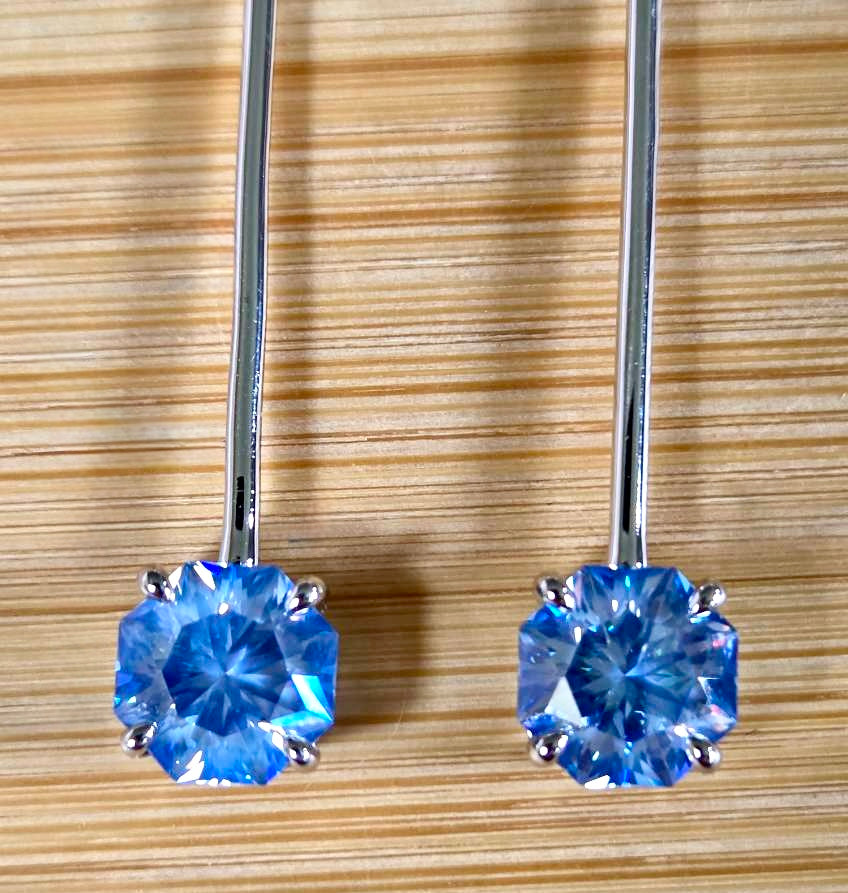 8ctw Moissanite pendulum earrings, with 3ct octagonal frosty aquamarine Moissanites at the bottom of the pendulum, and 1ct white round brilliant Moissanites at the top! Full Argentium silver construction with sterling silver disk backs! An HKJ exclusive!
