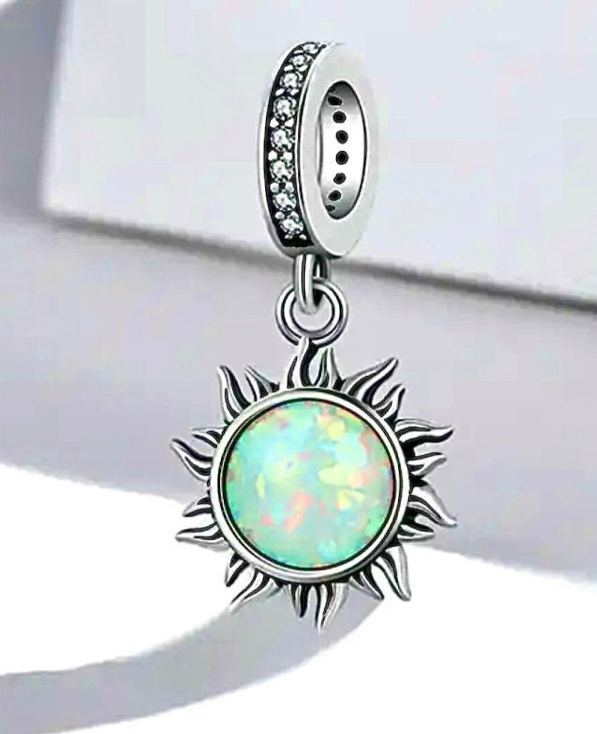 Rose charms and created opal charm! All solid sterling silver charms!