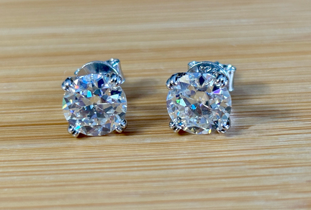 A lovely DOUBLE certified pair of 4cttw Old European Cut Moissanite studs in 935 Argentium silver and 18k double-claw mountings!