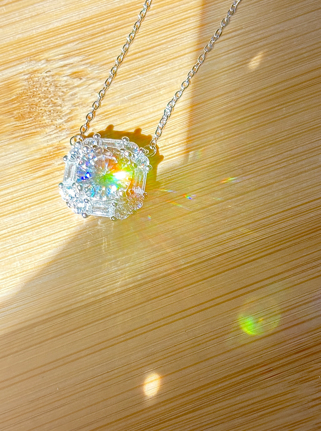 Moissanite necklace. A FIERY certified 3ct “8 hearts, 8 arrows” Moissanite in a super flashy geometric zircon halo, for a 4cttw necklace!