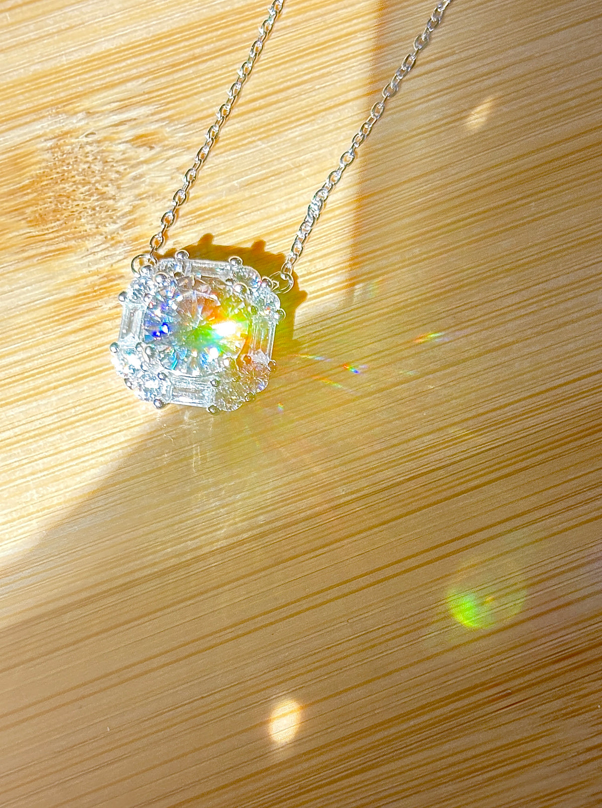 Moissanite necklace. A FIERY certified 3ct “8 hearts, 8 arrows” Moissanite in a super flashy geometric zircon halo, for a 4cttw necklace!