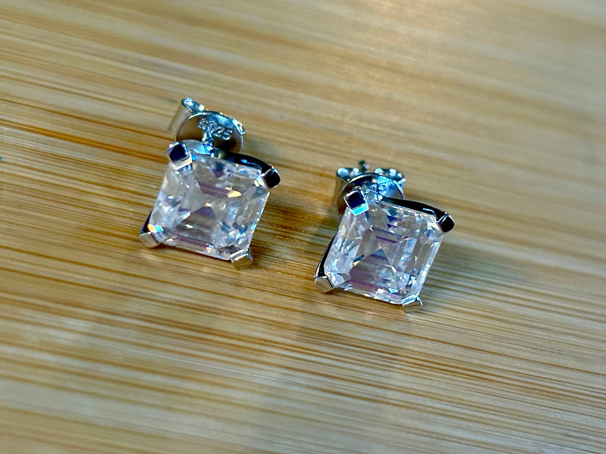 Moissanite studs. A 6.4ctw *perfect* pair of DOUBLE certified Asscher-cut Moissanites in my custom 4-claw 935 ARGENTIUM silver mountings! Opulent!