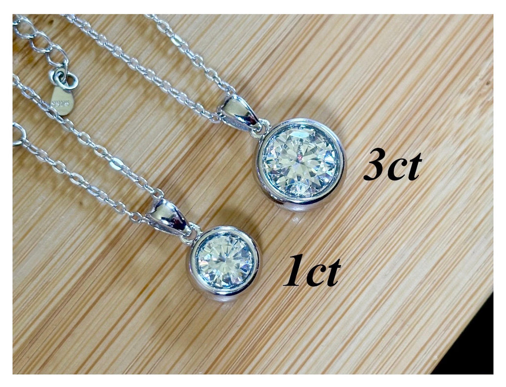 Moissanite necklace. My fiery “bubble bezel” necklace features a 1ct OR 3ct certified Moissanite in a heavy sterling silver bezel setting!