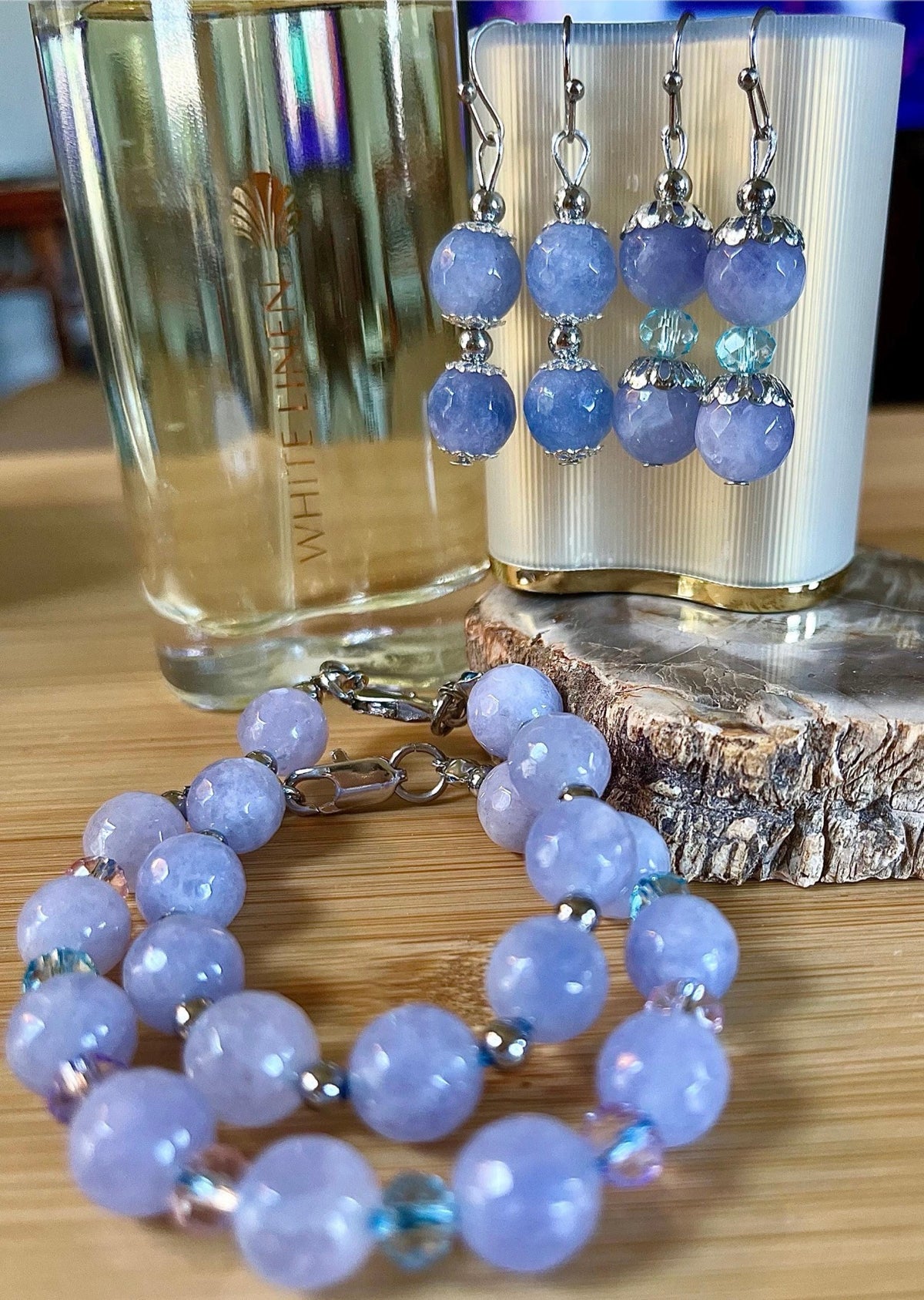 Aquamarine bracelets and/or earrings. Faceted 10mm aquamarines with your choice of crystal or stainless steel station beads and stainless steel color!