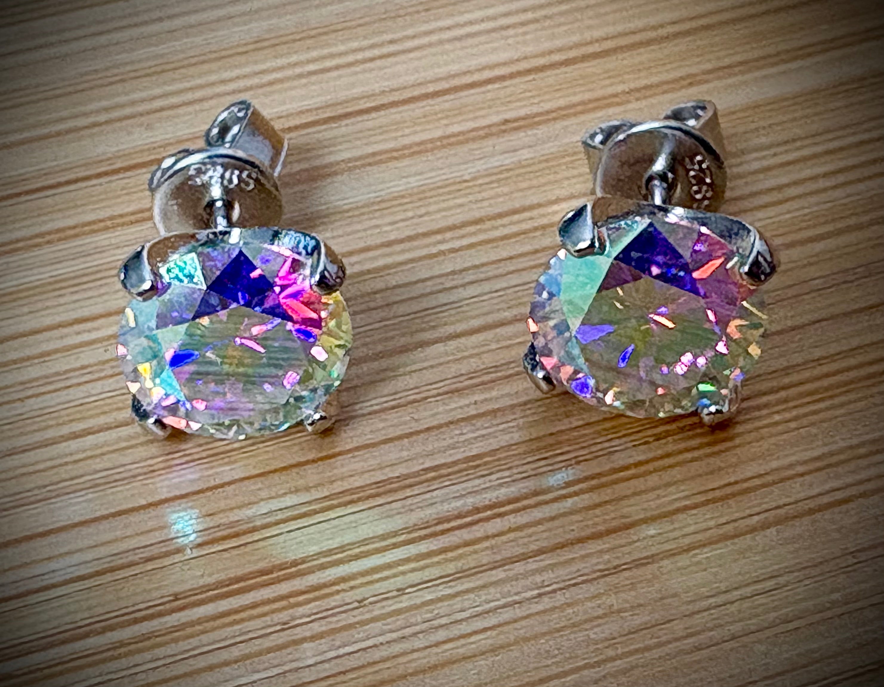 6ctw Moissanite “Kaleidoscope” studs! A pair of colorful, color-shifting, MESMERIZING Moissanite studs, DOUBLE certified and flashy in 18k plated sterling silver!