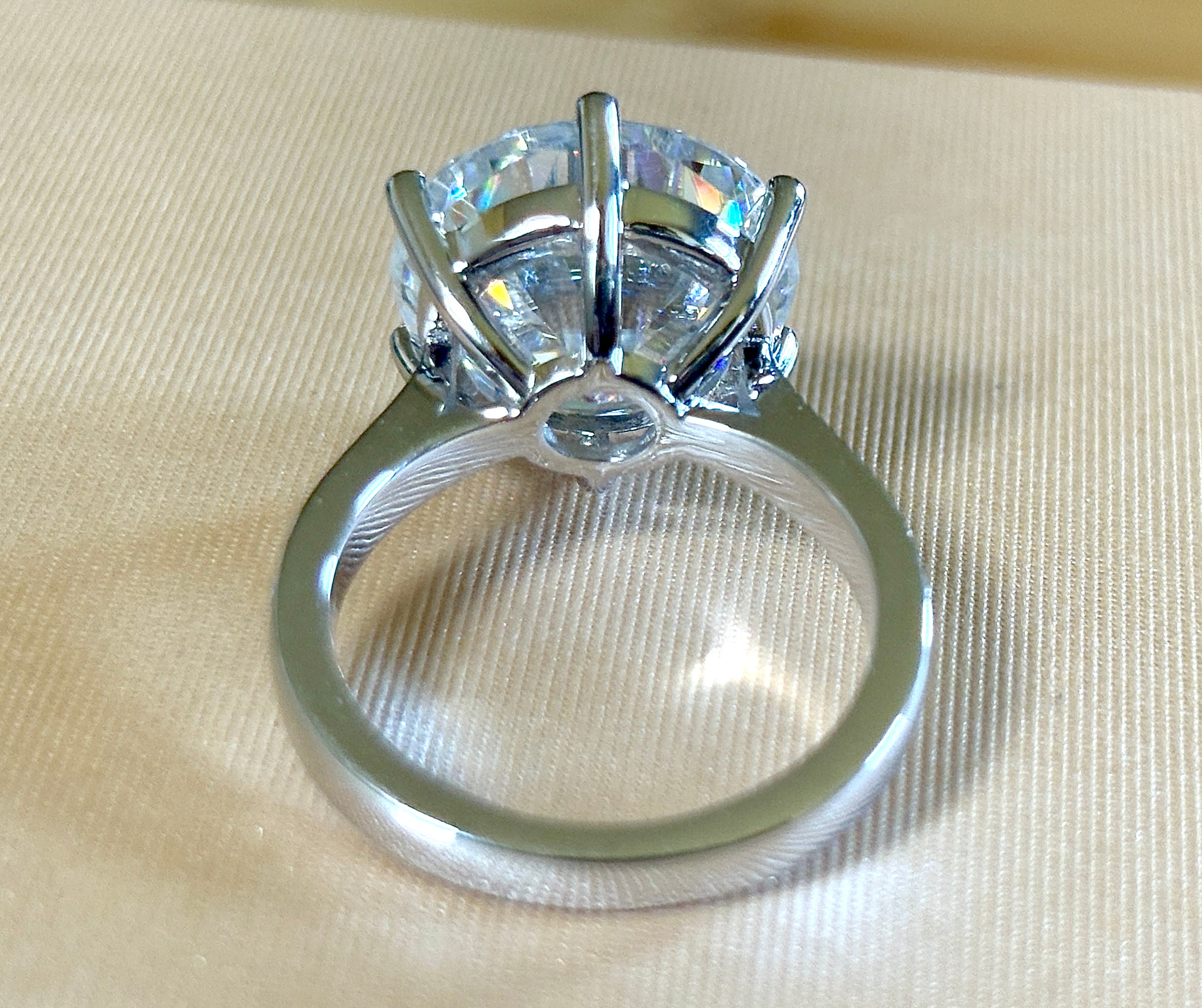 Moissanite ring. The 10ct certified 8H8A Moissanite “Tulip” statement ring with .50cttw Moissanite accents! Photos fail this GORGEOUS ring!