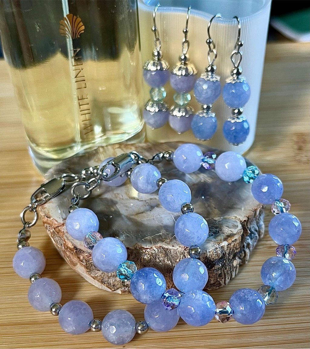Aquamarine bracelets and/or earrings. Faceted 10mm aquamarines with your choice of crystal or stainless steel station beads and stainless steel color!