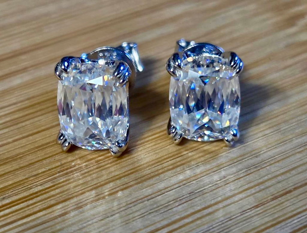 6ctw Ashoka-cut Moissanites in Argentium silver, hand-cut by a Master lapidary! These studs are the highest of the high end!