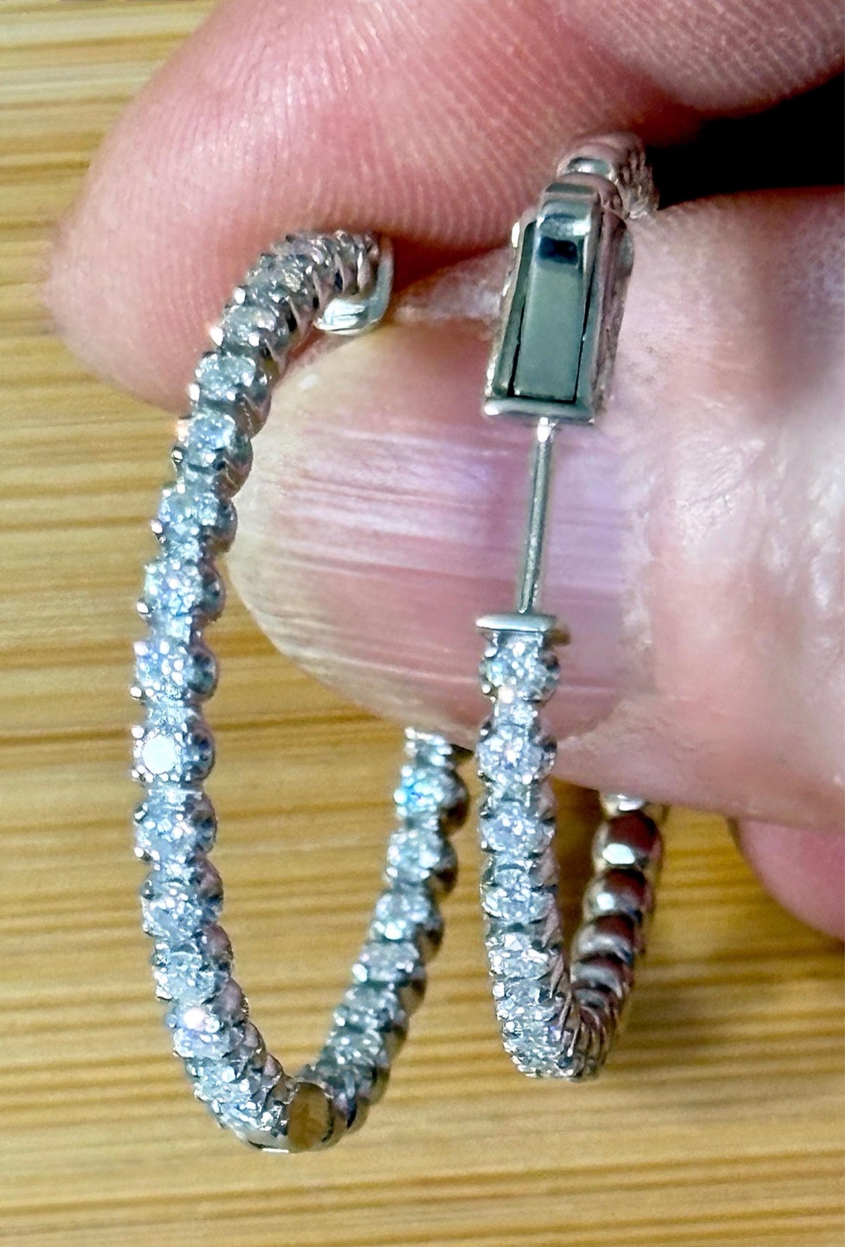 Moissanite hoops. These 1.8ctw Moissanite inside-out hoops *lock* in place so you can take your style from the office to the dance floor! So boogie down!