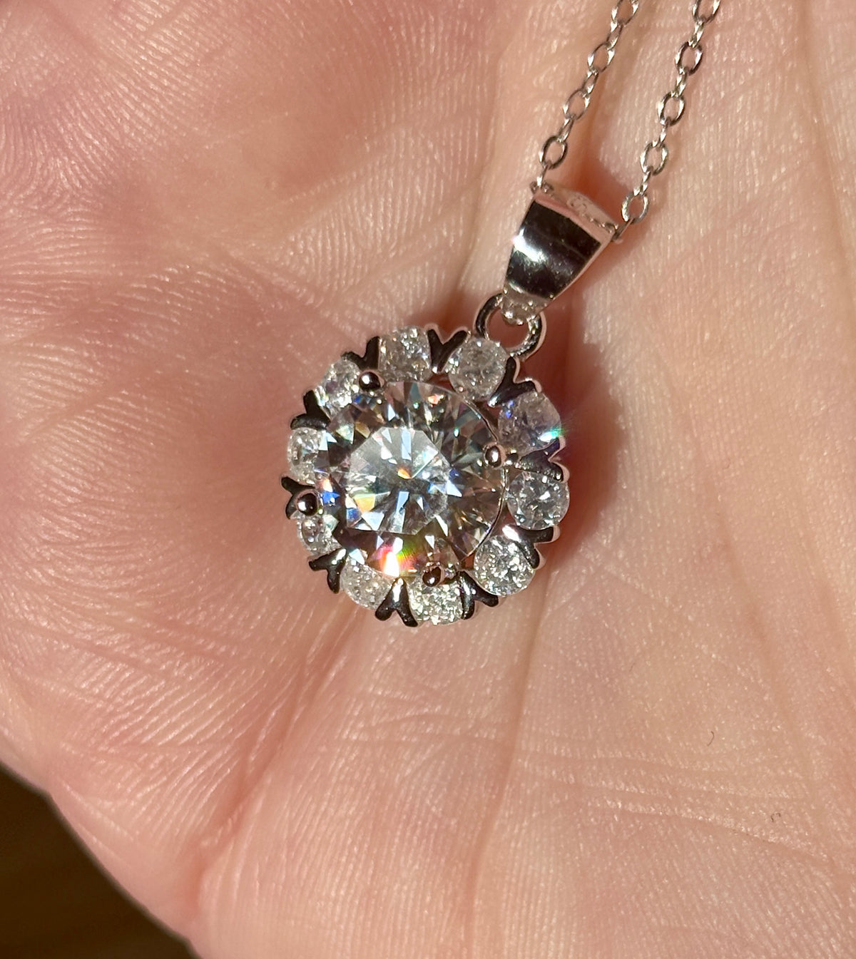 Moissanite necklace. A 3ct certified round brilliant Moissanite in a snowflake-shaped pendant ! A perfect piece for the holidays and beyond!